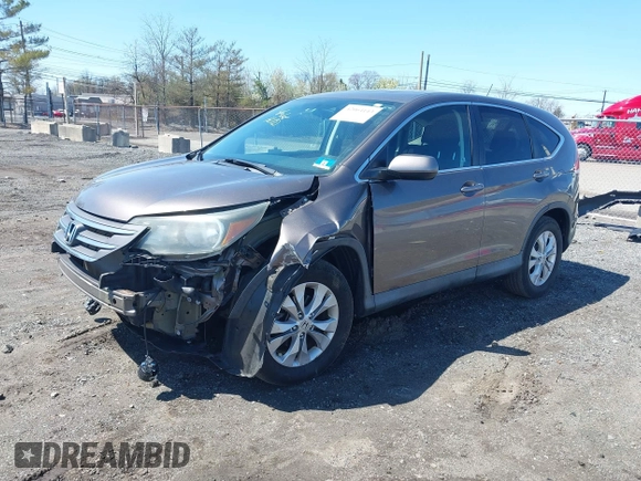 2014 Honda CR-V EX with VIN 2HKRM4H50EH628721, listed as a IAAI auction lot 42064143 with 103,009 mi miles and . Bid and sale history available at carsss.com. Image 2.