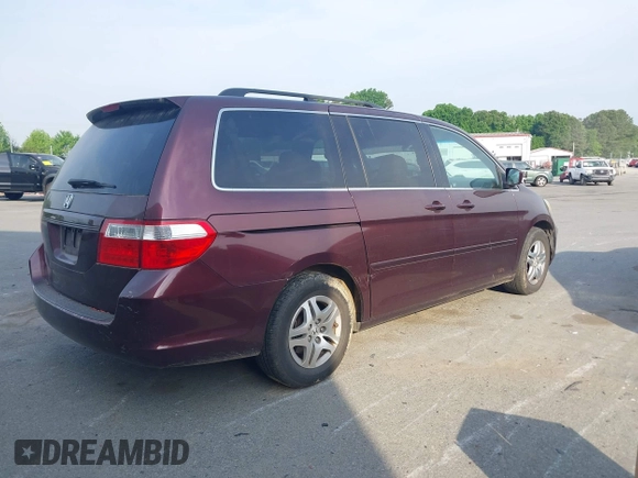 2007 Honda Odyssey EX-L with VIN 5FNRL387X7B140635, listed as a IAAI auction lot 42036807 with 292,774 mi miles. Bid and sale history available at carsss.com. Image 4.
