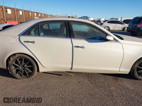 2014 Cadillac CTS Luxury AWD z VIN 1G6AX5SX3E0149360, wystawiony jako IAAI lot #41020479 z przebiegiem 98 917 mil mil oraz . Historia ofert i sprzedaży dostępna na DreamBid. Obrazek 12.