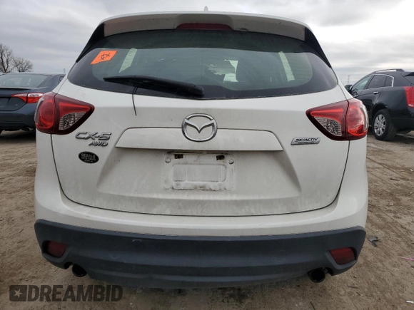 2015 Mazda CX-5 Sport z VIN JM3KE4BY2F0516574, wystawiony jako Copart lot #84100544 z przebiegiem Nie podano mil oraz Szkoda całkowita • Salvage title. Historia ofert i sprzedaży dostępna na DreamBid. Obrazek 6.
