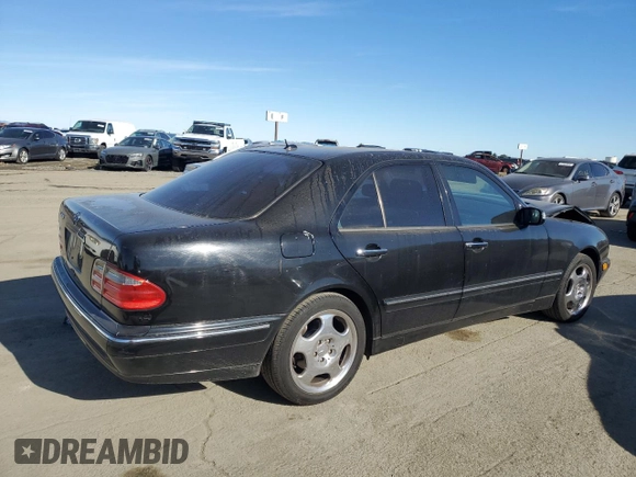 2001 Mercedes-Benz E-Class with VIN WDBJF70JX1B327997, listed as a Copart auction lot 87650175 with 268,045 mi miles and Salvage Title. Bid and sale history available at carsss.com. Image 3.