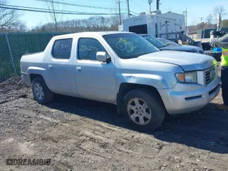 2007 Honda Ridgeline RTL w/Leather with VIN 2HJYK16557H538507, listed as a IAAI auction lot 41778794 with 999,999 mi miles. Bid and sale history available at carsss.com. Image 1.