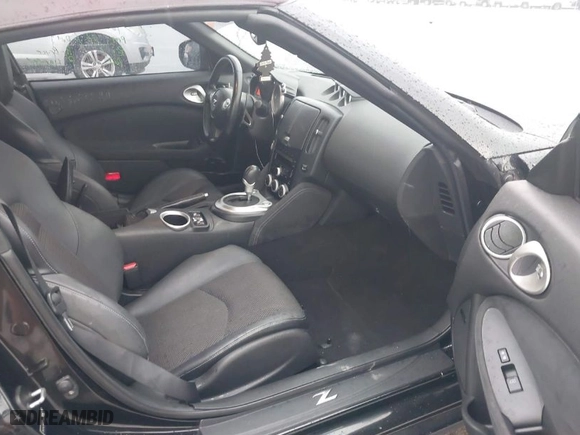 2010 Nissan 370Z Touring with VIN JN1AZ4FH7AM304809, listed as a IAAI auction lot 39876962 with 66,418 mi miles. Bid and sale history available at carsss.com. Image 5.