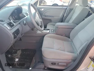 2006 Ford Five Hundred SE с VIN 1FAFP23146G157297, выставлен на аукционе Copart как лот 46508745 с пробегом 91 021 миль миль и Списание • Salvage title. История ставок и продаж доступна на DreamBid. Изображение 7.