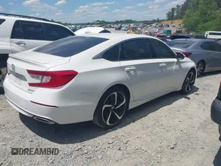 2019 Honda Accord Sport with VIN 1HGCV1F31KA029379, listed as a IAAI auction lot 42156139 with 58,238 mi miles and . Bid and sale history available at DreamBid. Image 4.