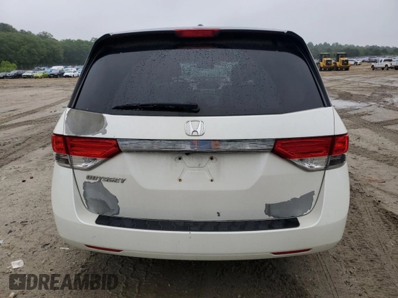 2014 Honda Odyssey EX-L with VIN 5FNRL5H63EB079306, listed as a Copart auction lot 57170635 with 256,140 mi miles and Clean title. Bid and sale history available at DreamBid. Image 6.