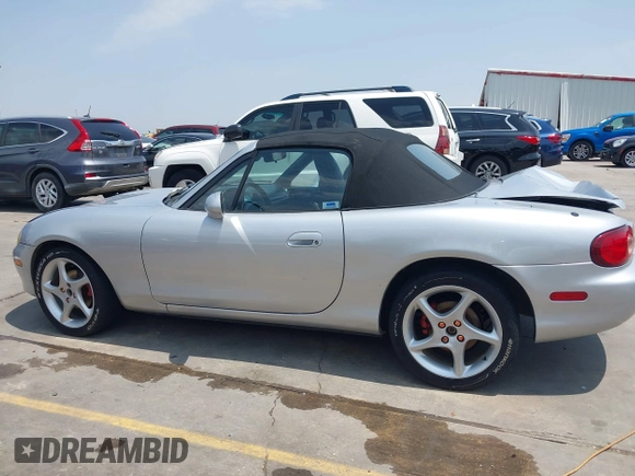 2002 Mazda MX-5 Miata Cloth z VIN JM1NB353020225252, wystawiony jako IAAI lot #42303820 z przebiegiem 194 549 mil mil oraz . Historia ofert i sprzedaży dostępna na DreamBid. Obrazek 14.