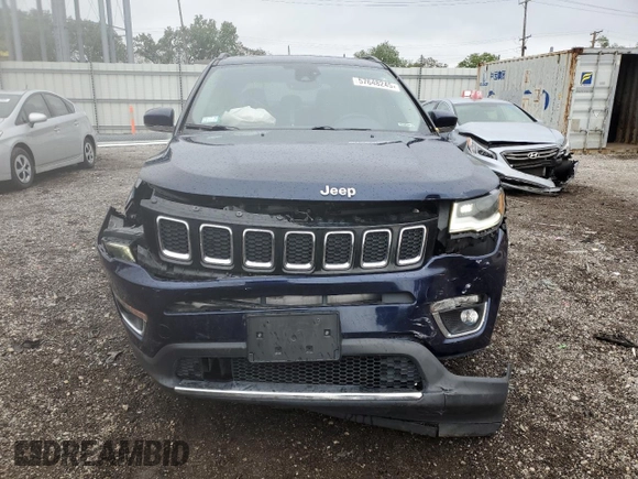 2018 Jeep Compass Limited with VIN 3C4NJDCB4JT128687, listed as a Copart auction lot 57648245 with 136,455 mi miles and Salvage title. Bid and sale history available at DreamBid. Image 5.
