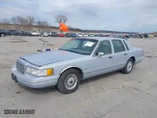 1994 Lincoln Town Car Signature with VIN 1LNLM82W4RY783450, listed as a IAAI auction lot 41858575 with 183,789 mi miles. Bid and sale history available at carsss.com. Image 2.
