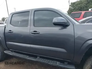 2023 Toyota Tacoma SR with VIN 3TYCZ5AN5PT138770, listed as a IAAI auction lot 41461423 with 19,785 mi miles and . Bid and sale history available at DreamBid. Image 13.