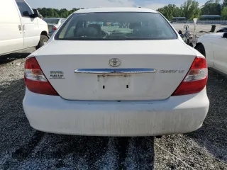 2002 Toyota Camry LE z VIN 4T1BE32K12U055722, wystawiony jako Copart lot #56522495 z przebiegiem 256 565 mil mil oraz Szkoda całkowita • Salvage title. Historia ofert i sprzedaży dostępna na DreamBid. Obrazek 6.