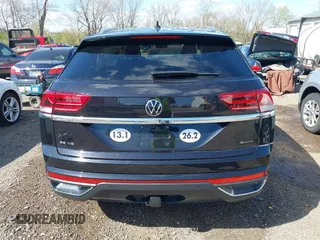 2023 Volkswagen Atlas SE z VIN 1V2HE2CA4PC209916, wystawiony jako IAAI lot #41957199 z przebiegiem 24 799 mil mil oraz . Historia ofert i sprzedaży dostępna na DreamBid. Obrazek 17.