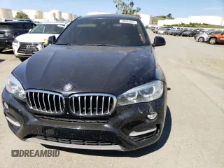 2015 BMW X6 xDrive50i with VIN 5UXKU6C53F0F94035, listed as a Copart auction lot 49604204 with 122,910 mi miles and Salvage Title. Bid and sale history available at carsss.com. Image 5.