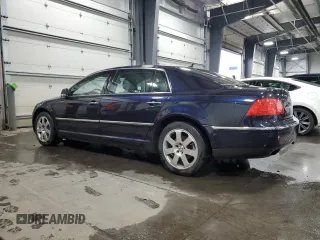 2004 Volkswagen Phaeton V8 z VIN WVWAF63D148009799, wystawiony jako Copart lot #84174554 z przebiegiem 130 548 mil mil oraz Szkody całkowita. Historia ofert i sprzedaży dostępna na DreamBid. Obrazek 2.