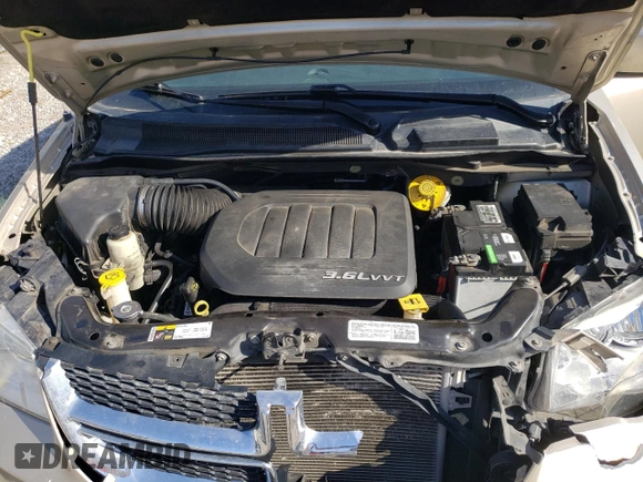 2014 Dodge Grand Caravan SXT with VIN 2C4RDGCG3ER347350, listed as a Copart auction lot 50575985 with 111,078 mi miles and Salvage Title. Bid and sale history available at DreamBid. Image 12.