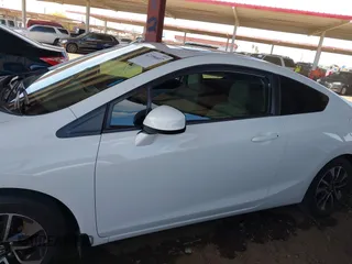 2012 Honda Civic EX z VIN 2HGFG3A89CH557700, wystawiony jako IAAI lot #42106607 z przebiegiem 145 884 mil mil oraz . Historia ofert i sprzedaży dostępna na DreamBid. Obrazek 14.