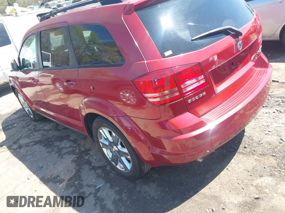 2009 Dodge Journey SXT with VIN 3D4GG57V39T522388, listed as a IAAI auction lot 41909709 with 208,738 mi miles. Bid and sale history available at carsss.com. Image 3.