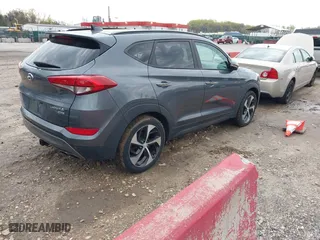 2016 Hyundai Tucson Limited with VIN KM8J3CA27GU088248, listed as a IAAI auction lot 42033882 with 102,112 mi miles. Bid and sale history available at carsss.com. Image 4.