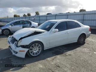 2007 Mercedes-Benz E-Class 3.5L with VIN WDBUF56X47B084760, listed as a Copart auction lot 84942024 with 117,213 mi miles and Salvage Title. Bid and sale history available at carsss.com. Image 1.
