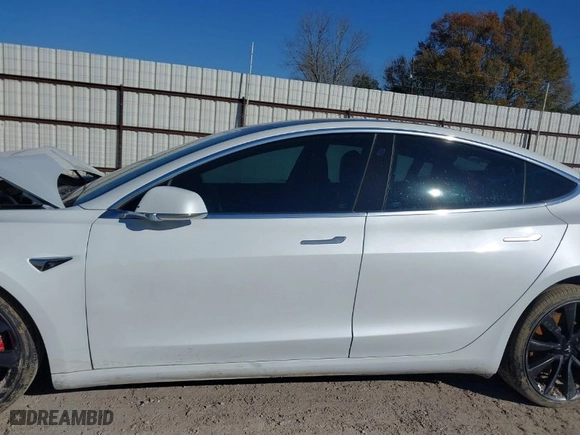 2020 Tesla Model 3 Performance with VIN 5YJ3E1EC2LF623827, listed as a IAAI auction lot 41360239 with NaN miles. Bid and sale history available at carsss.com. Image 14.