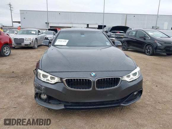 2016 BMW 4 Series 428i with VIN WBA4A9C53GG508245, listed as a IAAI auction lot 41607436 with 95,938 mi miles. Bid and sale history available at carsss.com. Image 12.