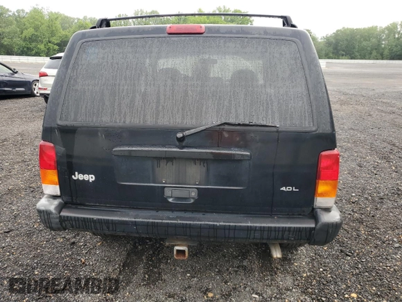 1999 Jeep Cherokee Sport with VIN 1J4FF68S8XL671341, listed as a Copart auction lot 58136475 with 139,848 mi miles and Salvage title. Bid and sale history available at DreamBid. Image 6.