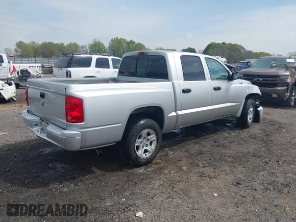 2007 Dodge Dakota SLT with VIN 1D7HE48KX7S122712, listed as a IAAI auction lot 41888864 with 114,384 mi miles and . Bid and sale history available at carsss.com. Image 4.