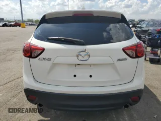 2015 Mazda CX-5 Touring with VIN JM3KE2CY7F0445603, listed as a Copart auction lot 54582225 with 123,319 mi miles and Clean Title. Bid and sale history available at carsss.com. Image 6.