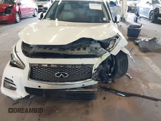 2015 Infiniti Q50 Premium with VIN JN1BV7APXFM353042, listed as a IAAI auction lot 42327460 with 108,497 mi miles and . Bid and sale history available at DreamBid. Image 6.