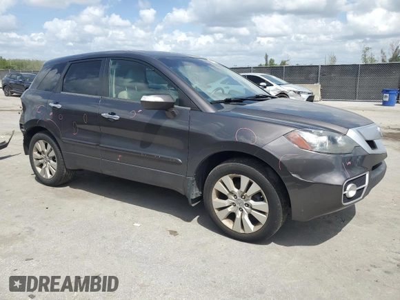 2011 Acura RDX Technology with VIN 5J8TB2H57BA001695, listed as a Copart auction lot 52137925 with 218,562 mi miles and Salvage title. Bid and sale history available at DreamBid. Image 4.
