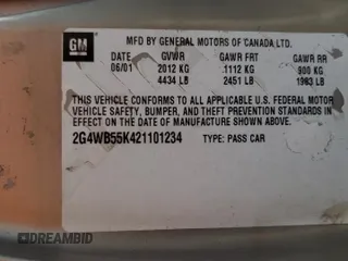 2002 Buick Regal LS z VIN 2G4WB55K421101234, wystawiony jako Copart lot #54744355 z przebiegiem Nie podano mil oraz Szkoda całkowita • Salvage title. Historia ofert i sprzedaży dostępna na DreamBid. Obrazek 13.