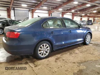 2012 Volkswagen Jetta SE z VIN 3VWDX7AJ1CM071753, wystawiony jako Copart lot #44001405 z przebiegiem 148 102 mil mil oraz Czysty tytuł • Clean title. Historia ofert i sprzedaży dostępna na DreamBid. Obrazek 3.
