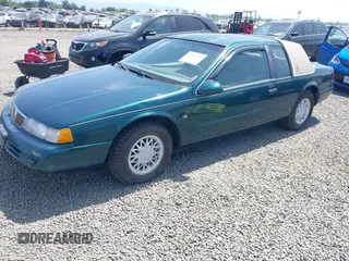 1995 Mercury Cougar z VIN 1MELM62W5SH606001, wystawiony jako IAAI lot #42461451 z przebiegiem 83 279 mil mil oraz . Historia ofert i sprzedaży dostępna na DreamBid. Obrazek 2.