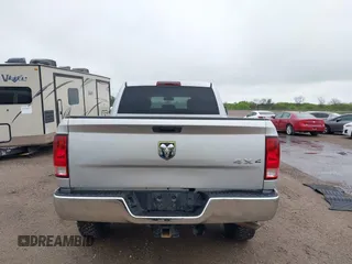 2013 Ram 2500 Tradesman z VIN 3C6TR5CT1DG562584, wystawiony jako IAAI lot #41958471 z przebiegiem 185 426 mil mil oraz . Historia ofert i sprzedaży dostępna na DreamBid. Obrazek 16.
