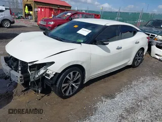 2017 Nissan Maxima SV with VIN 1N4AA6APXHC416086, listed as a IAAI auction lot 41694314 with 192,513 mi miles and . Bid and sale history available at DreamBid. Image 2.