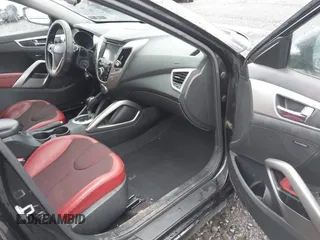 2012 Hyundai Veloster w/Gray Int z VIN KMHTC6AD0CU080630, wystawiony jako IAAI lot #42191015 z przebiegiem 48 405 mil mil oraz . Historia ofert i sprzedaży dostępna na DreamBid. Obrazek 5.
