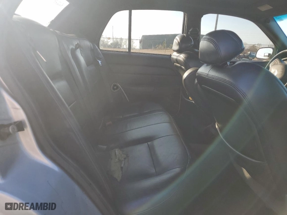2004 Ford Crown Victoria LX with VIN 2FDFP74W74X150801, listed as a Copart auction lot 43869115 with 138,243 mi miles and Salvage Title. Bid and sale history available at carsss.com. Image 11.
