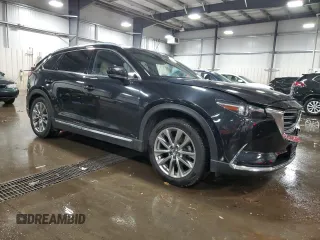 2018 Mazda CX-9 Grand Touring with VIN JM3TCBDYXJ0223039, listed as a Copart auction lot 58305265 with 101,195 mi miles and Salvage title. Bid and sale history available at DreamBid. Image 4.
