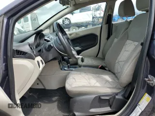 2013 Ford Fiesta SE z VIN 3FADP4EJ8DM146676, wystawiony jako Copart lot #55565485 z przebiegiem 168 801 mil mil oraz Szkoda całkowita • Salvage title. Historia ofert i sprzedaży dostępna na DreamBid. Obrazek 7.