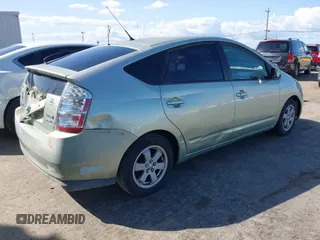 2007 Toyota Prius z VIN JTDKB20U877556527, wystawiony jako IAAI lot #41965245 z przebiegiem 259 572 mil mil oraz . Historia ofert i sprzedaży dostępna na DreamBid. Obrazek 4.