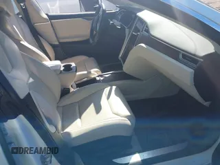 2017 Tesla Model S 100D with VIN 5YJSA1E22HF219352, listed as a IAAI auction lot 41831322 with 97,516 mi miles and . Bid and sale history available at DreamBid. Image 5.