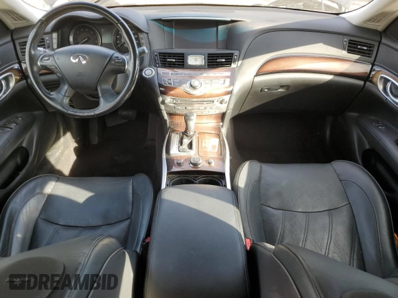 2015 Infiniti Q70 z VIN JN1BY1AP6FM541710, wystawiony jako Copart lot #47126225 z przebiegiem 57 304 mil mil oraz Szkoda całkowita • Salvage title. Historia ofert i sprzedaży dostępna na DreamBid. Obrazek 8.