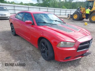 2013 Dodge Charger RT with VIN 2C3CDXCT7DH647923, listed as a IAAI auction lot 41934831 with 136,015 mi miles. Bid and sale history available at carsss.com. Image 1.