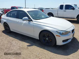 2014 BMW 3 Series 320i with VIN WBA3B1C53EP680072, listed as a IAAI auction lot 41996500 with 192,948 mi miles. Bid and sale history available at carsss.com. Image 1.