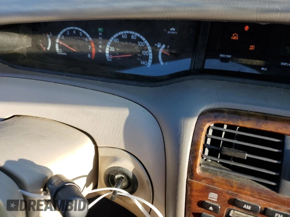 2001 Toyota Avalon XL z VIN 4T1BF28B81U162506, wystawiony jako Copart lot #52031805 z przebiegiem 212 437 mil mil oraz Szkody całkowita. Historia ofert i sprzedaży dostępna na DreamBid. Obrazek 9.