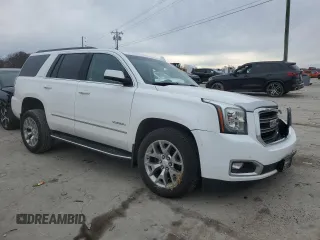 2019 GMC Yukon SLE with VIN 1GKS2AKC0KR275077, listed as a Copart auction lot 84231604 with 93,907 mi miles and Salvage Title. Bid and sale history available at carsss.com. Image 4.