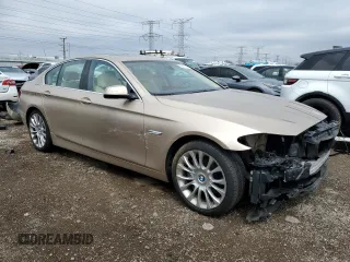 2013 BMW 5 Series 550i xDrive with VIN WBAFU9C55DDY71630, listed as a Copart auction lot 52511635 with 51,474 mi miles and Salvage title. Bid and sale history available at DreamBid. Image 4.