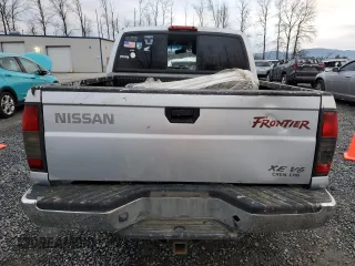 2000 Nissan Frontier XE z VIN 1N6ED27Y8YC368144, wystawiony jako Copart lot #87784565 z przebiegiem Nie podano mil oraz Czysty tytuł • Clean title. Historia ofert i sprzedaży dostępna na DreamBid. Obrazek 6.