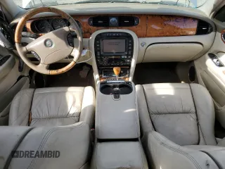 2004 Jaguar XJ VDP with VIN SAJWA74C94SG23829, listed as a Copart auction lot 82214944 with 126,887 mi miles and Salvage Title. Bid and sale history available at carsss.com. Image 8.