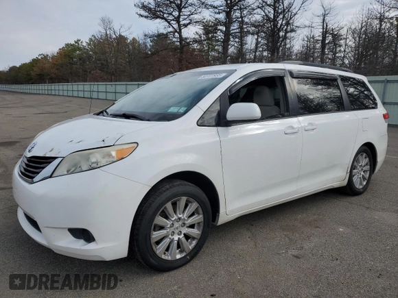 2012 Toyota Sienna LE with VIN 5TDJK3DC5CS040337, listed as a Copart auction lot 50701935 with 201,024 mi miles and Salvage Title. Bid and sale history available at carsss.com. Image 1.